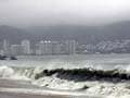 Hurricane Raymond swirls off Mexico, hits Acapulco with more rain