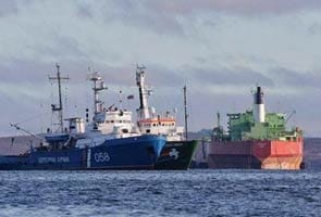 Russia claims drugs found on Greenpeace ship, plans new charges