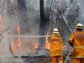 Australian fire crisis eases, blazes still threaten small towns