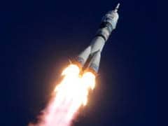 Russian spacecraft carrying Olympic torch docks with ISS