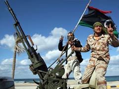 Militias attack Libyan protesters, killing 22