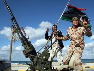Militias attack Libyan protesters, killing 22 