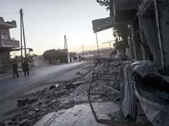 Syria rebel chieftain killed; Bashar Assad forces bomb besieged town