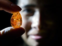 World's largest orange diamond sold for $31.5m in Swiss auction