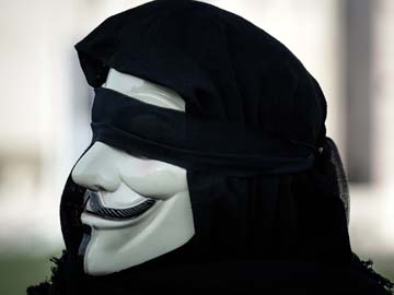 Anonymous Philippines protests in front of parliament, pledges more attacks