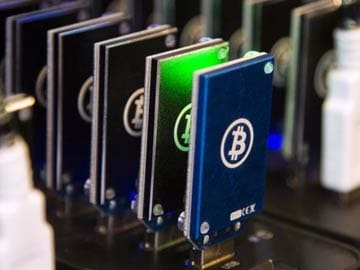 Bitcoin surpasses $1,000 for first time