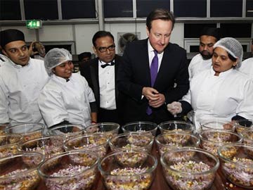 Britain Prime Minister David Cameron hails Indian food as great British industry