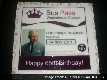 In Kochi, a cake in shape of a free bus pass for Prince Charles 65th birthday