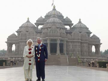 Britain's Prince Charles, wife visit slum school, Akshardham temple in Delhi