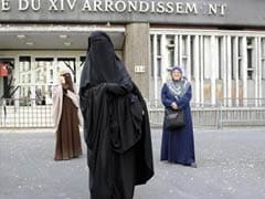 France reaffirms limits on Muslim headscarves, veils
