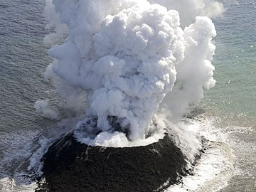 Volcano raises new island far south of Japan