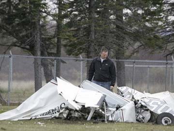 Nine skydivers leap to safety after planes collide in midair