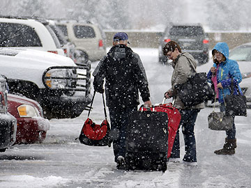 Rain and snow threaten to disrupt US holiday travel