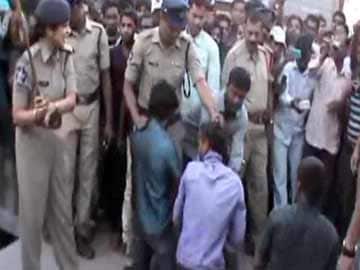 Action against Andhra Pradesh cops who thrashed murder suspects in public