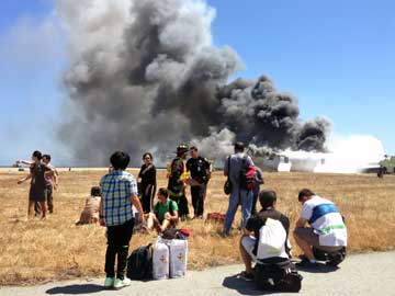 Asiana crash victim was run over twice: report