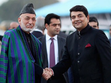 Afghanistan President Hamid Karzai arrives in India on four-day visit