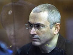 Freed from jail, Mikhail Khodorkovsky reunited with family in Berlin