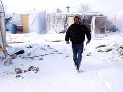 Snowstorm brings new misery for Syria refugees