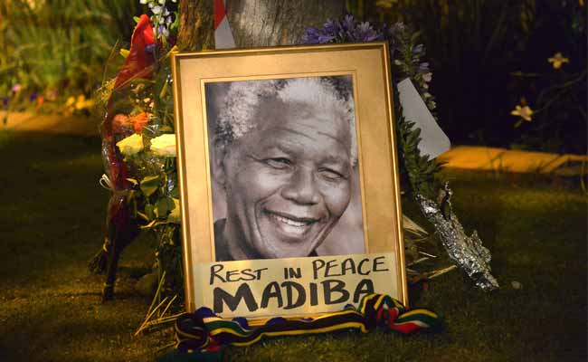 Barack Obama to attend Nelson Mandela's memorial on Tuesday: official