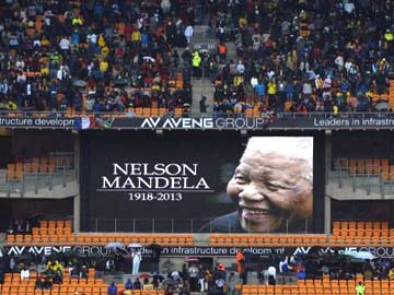 Leaders gather, thousands sing in rain in farewell to Nelson Mandela