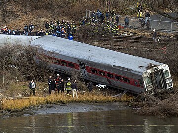 Derailment of a commuter train in the Bronx kills four and injures dozens