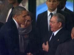 Barack Obama shakes hands with Cuba's Raul Castro at Nelson Mandela memorial