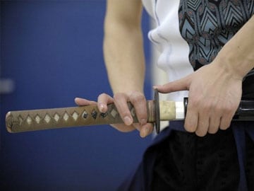 Sword-wielding 'subway samurai' faces flogging in Singapore 
