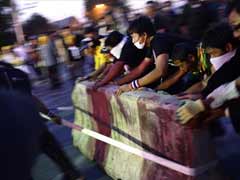 Thailand Prime Minister Shinawatra says protesters' demands unacceptable
