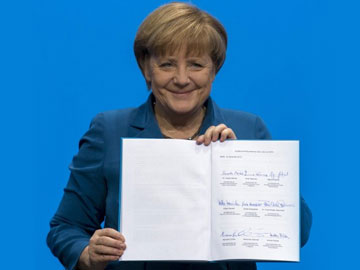 Angela Merkel, finally, to be sworn in ending political limbo