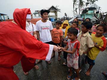 Christmas in mud as rain pelts Philippine disaster zone