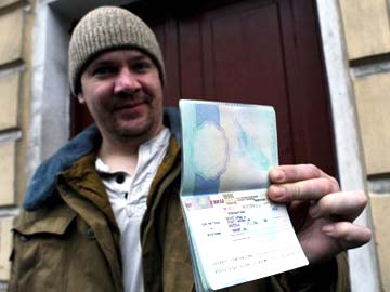 First Greenpeace activist gets visa to leave Russia