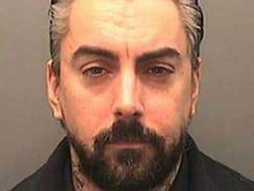 British rock singer Ian Watkins jailed for 35 years for child sex abuse