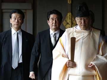 China media condemns Japan PM for paying homage to 'devils'