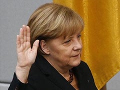 Germany's Angela Merkel begins third term with focus on Europe