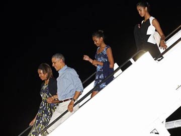 Obamas hit Hawaii for year-end vacation