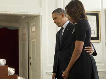 Obamas observe silence on Newtown massacre anniversary