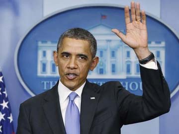 Barack Obama symbolically signs up for Obamacare