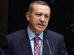 Scandal-hit Turkey Prime Minister presses police purge