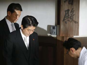 Japanese Prime Minister Shinzo Abe visits Yasukuni Shrine for war dead