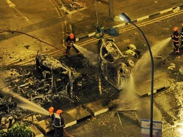 Cars burnt as workers riot in Singapore's Little India