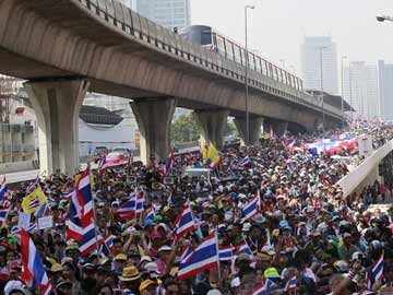Protesters swarm in Thai capital to demand PM resigns