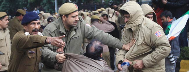 Protesters from Arvind Kejriwal's AAP break barricades, throw stones at cops