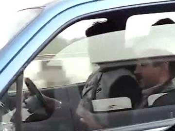 Guess who's in the next car? Delhi's Chief Minister Arvind Kejriwal