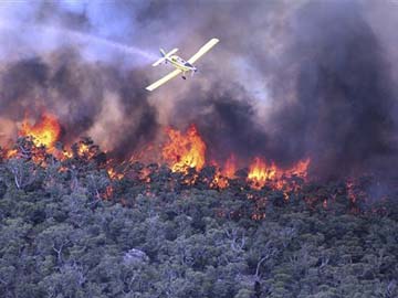 More than 90 wildfires blaze in Australian state