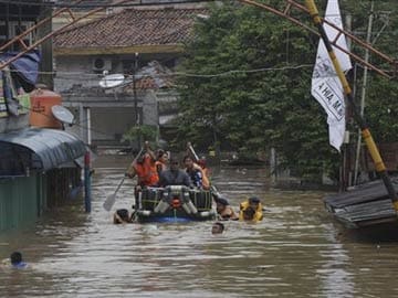 Floods, landslide kill 13 in Indonesia; 2 missing