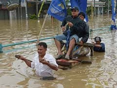 30,000 displaced by deadly floods in Indonesian capital