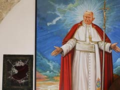 Italy police recover blood cloth from relic of Pope John Paul II