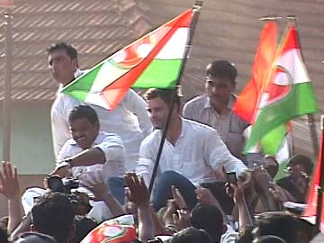 Rahul Gandhi sits on top of police vehicle, sparks controversy