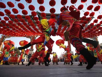 Chinese give Year of the Horse a toned-down welcome