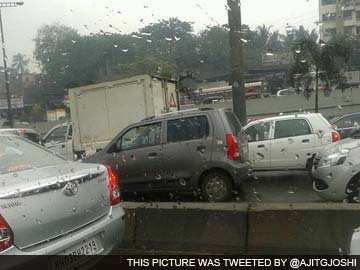 Delhi: Rain during morning rush hour leads to traffic chaos